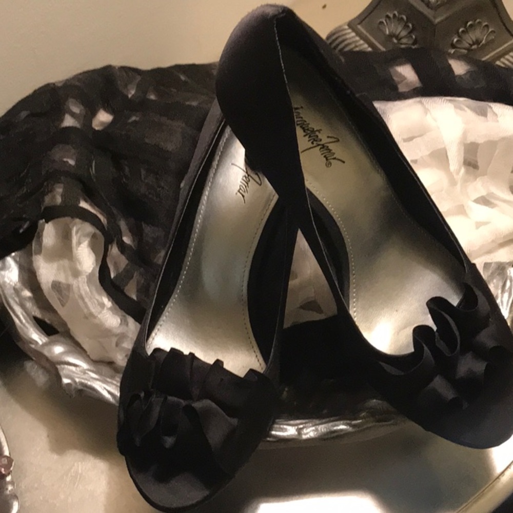 Dress with class in these black dress pumps!